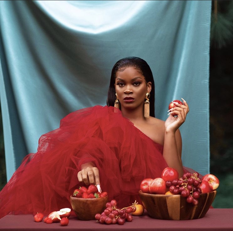 Shop the Look: Ari Lennox Looked Stunning as she Posed for her New Single “Chocolate Pomegranate” Wearing a Ruby Veronica Dress by Oyemwen