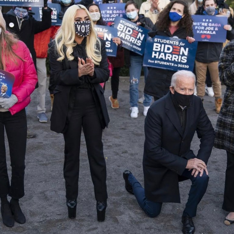 Lady Gaga Wears Alexander McQueen FW20 Ready-to-Wear Suit and Michael NGO ‘Vote’ Triple Crystal Mask on Biden-Harris Campaign in Pennsylvania