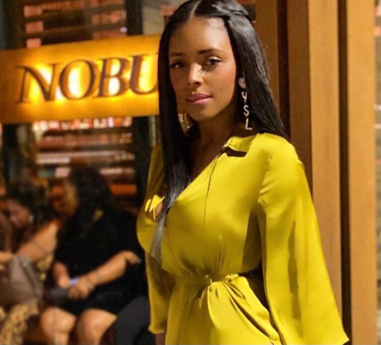 You Ask, We Answer! Angel Love Wore a $40 Mustard Zara Belted Satin Dress, Miu Miu Suede Color Block Pumps, and Beige Saint Laurent Monogram Chain Wallet at Nobu