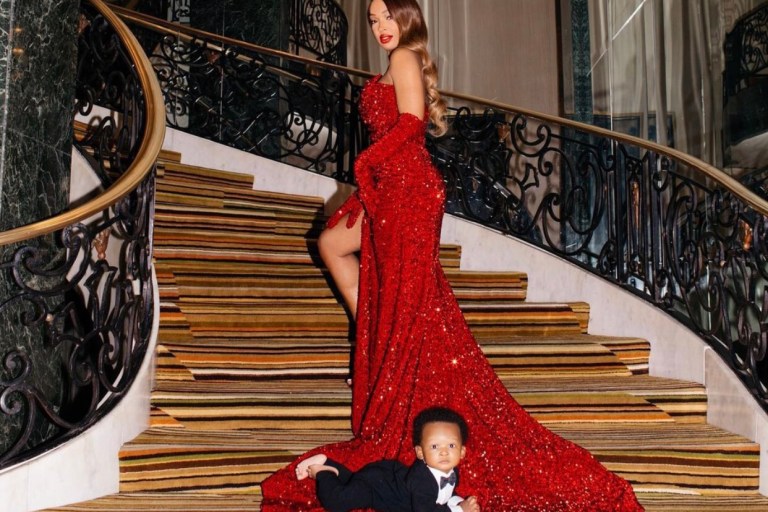 Malika Haqq Strikes A Pose in Red Lena Berisha Gown for Holiday Photo with Her Son Ace