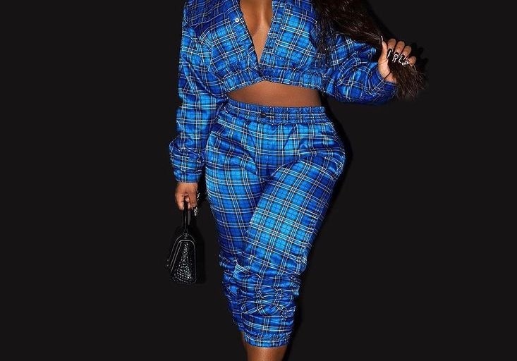 Reginae Carter Posed Wearing Fashion Nova’s Blue Plaid Joggers and Matching Jacket