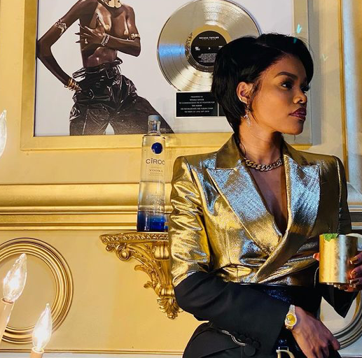 You Ask, We Answer! Teyana Taylor Celebrated New Years With Ciroc Rocking a $3,090 Black and Gold Alexander McQueen Blazer and $1,250 Dior Saddle Belt