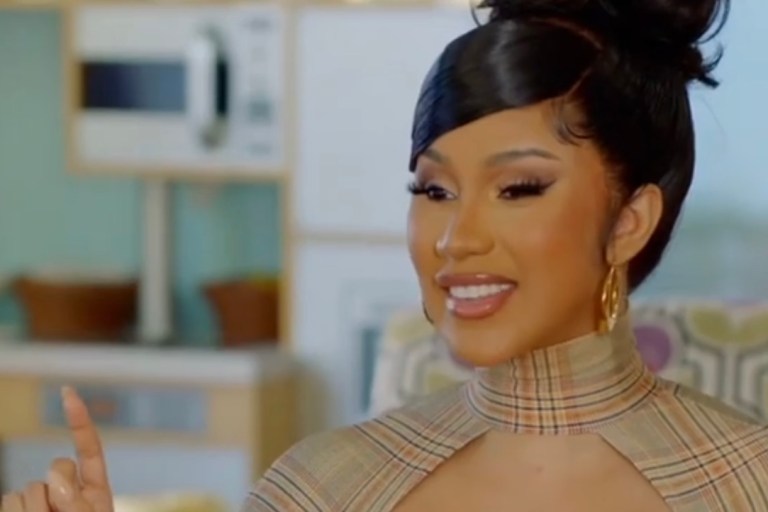 Cardi B Spotted in $2,490 Burberry Checked Cutout Stretch Jersey Dress on Facebook Watch Series ‘Cardi Tries’