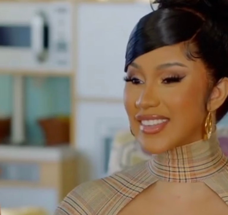 Cardi B Spotted in $2,490 Burberry Checked Cutout Stretch Jersey Dress on Facebook Watch Series ‘Cardi Tries’