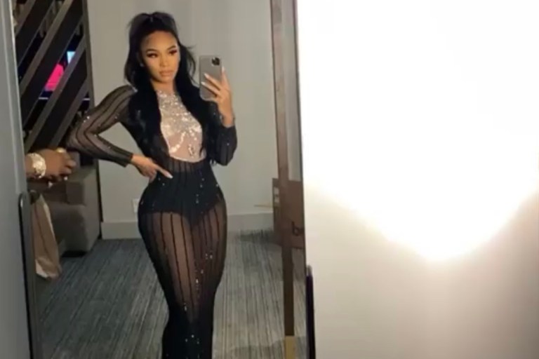 Jamira ‘Cuban Link’ Haines Posed With Beau 50 Cent in Angel Brinks Sheer Bib Dress for New Years