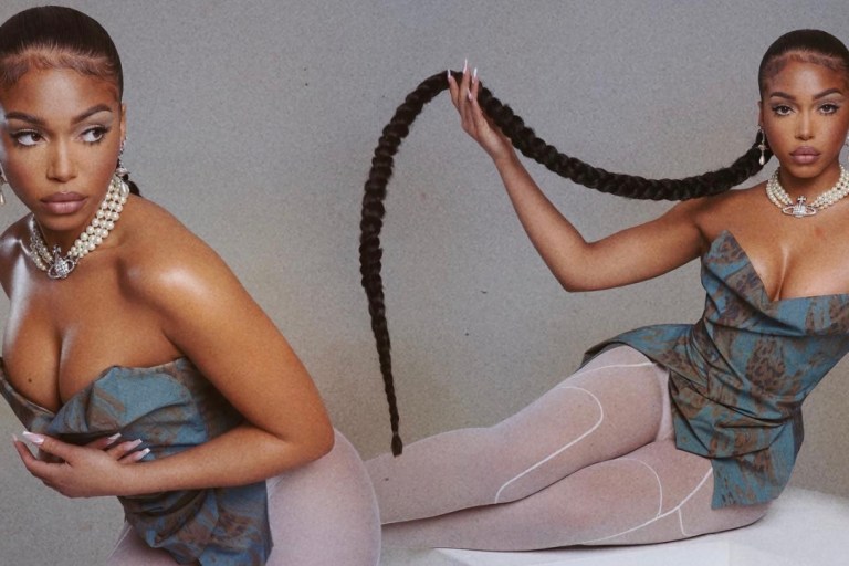 Lori Harvey Celebrated Her Birthday in Vivienne Westwood Gold Label Blue Animal Print Corset and Pearl Orb Earrings + Katie Gallagher White Leggings