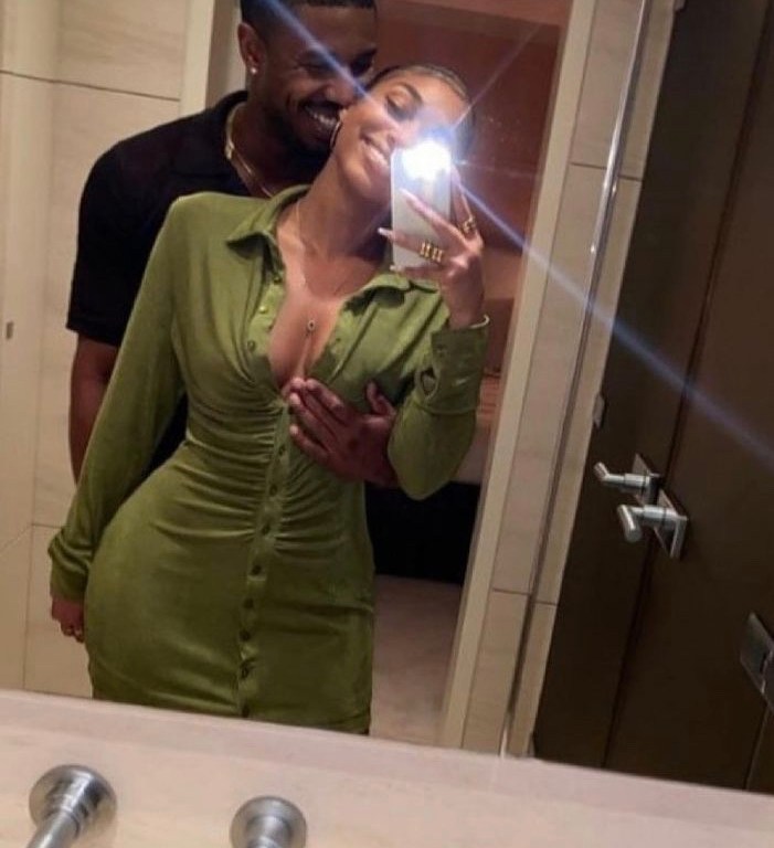 Lori Harvey is All Smiles With Michael B. Jordan Wearing A Green Button Dress From With Jean