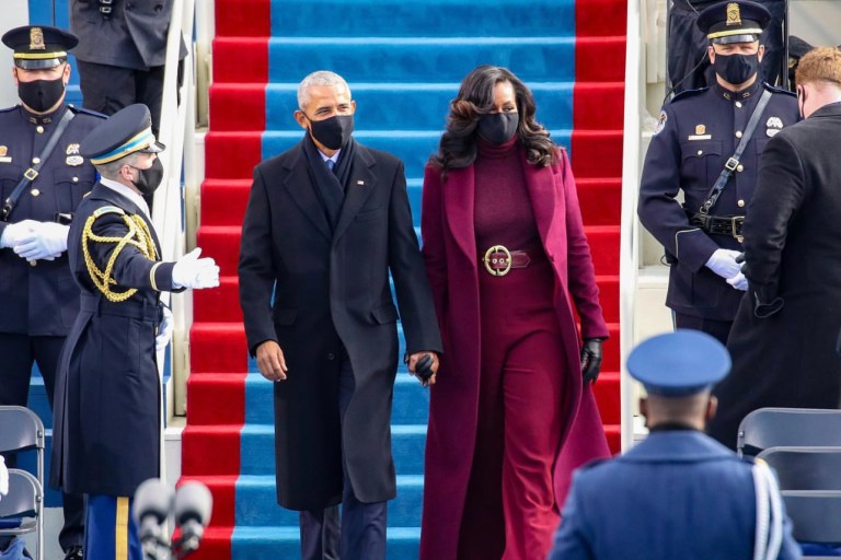 Michelle Obama Wears Sergio Hudson Burgundy Coat, Shirt, and Pants to the 2021 Presidential Inauguration in Washington D.C.