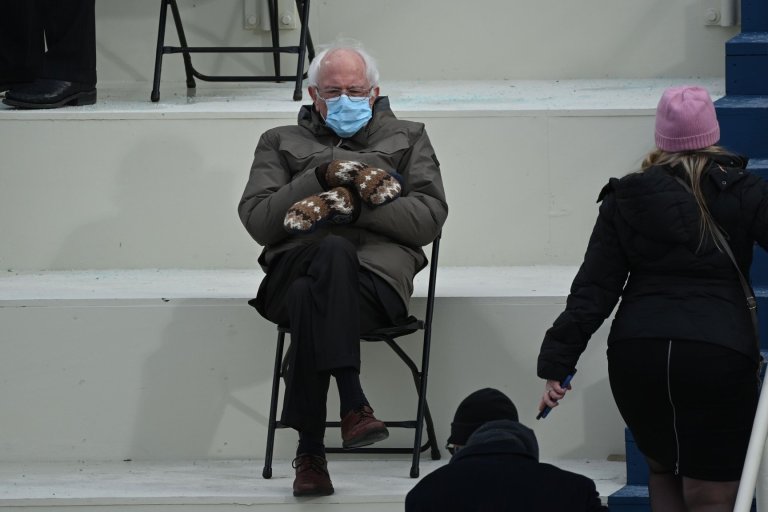 Wardrobe Inquiry: Bernie Sanders Viral 2021 Presidential Inauguration Look Included A Brown Hooded Burton GORE-TEX Jacket and Reworked Mittens Made From Sweaters and Plastic Bottles by Vermont Teacher Jen Ellis