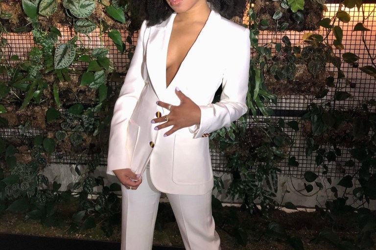 ‘Judas and the Black Messiah’ Star Dominique Fishback Appeared on Jimmy Kimmel Live in Louis Vuitton Pre-Fall 2020 White Button-Up Suit and Gold Giuseppe Zanotti Heels