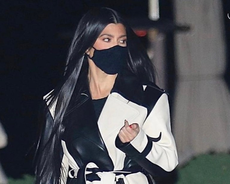 Kourtney Kardashian Stepped Out in LA Rocking Celine Pre-Fall 2018 Black and White Colorblock Leather Trench Coat