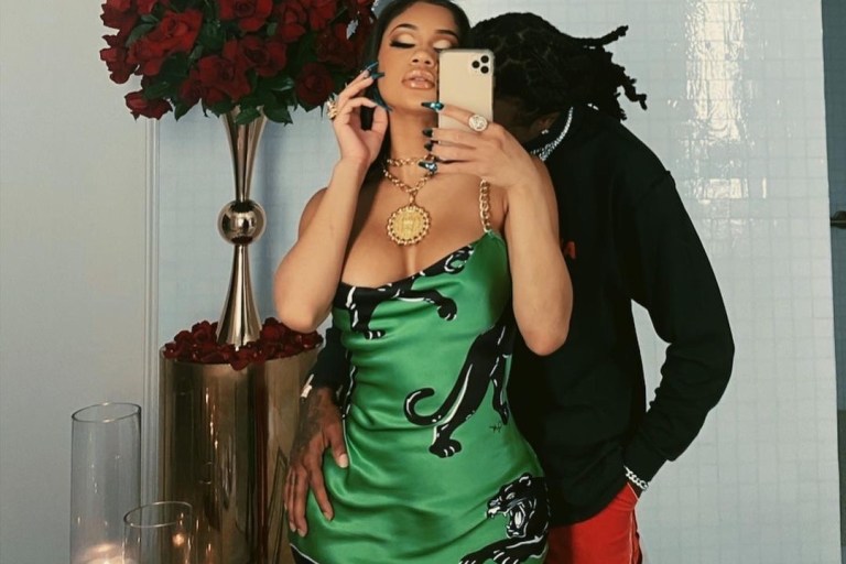 You Ask, We Answer! Saweetie’s Valentine’s Day Green Olivia von Halle Black Panther Print Chain Strap Dress