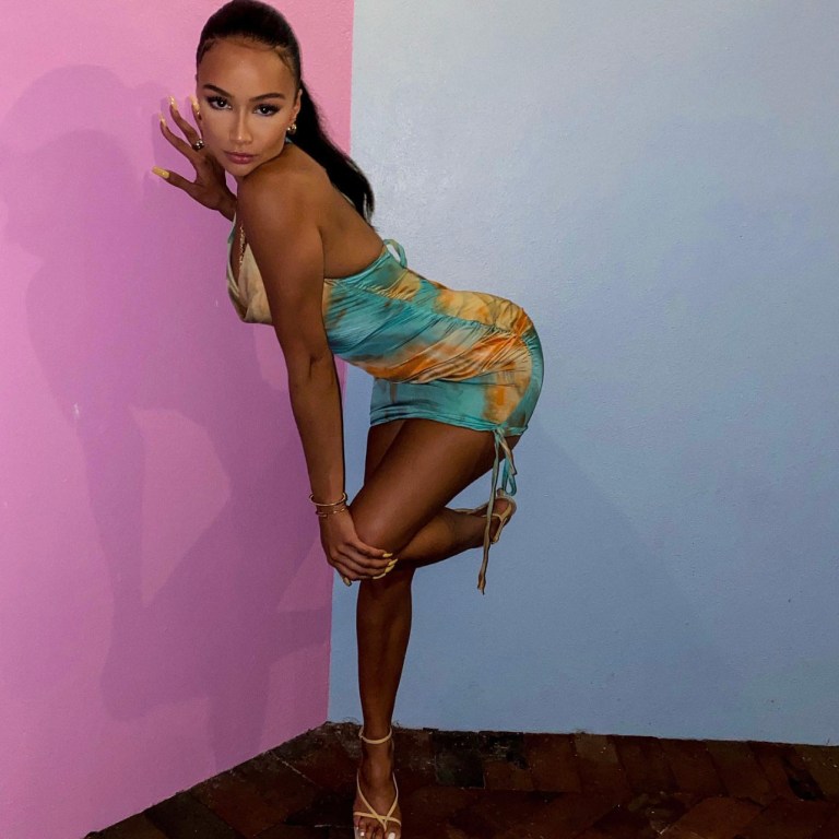 Draya Michele Stuns in Fashion Nova Cowl Neck Satin Tie-Dye Mini Dress