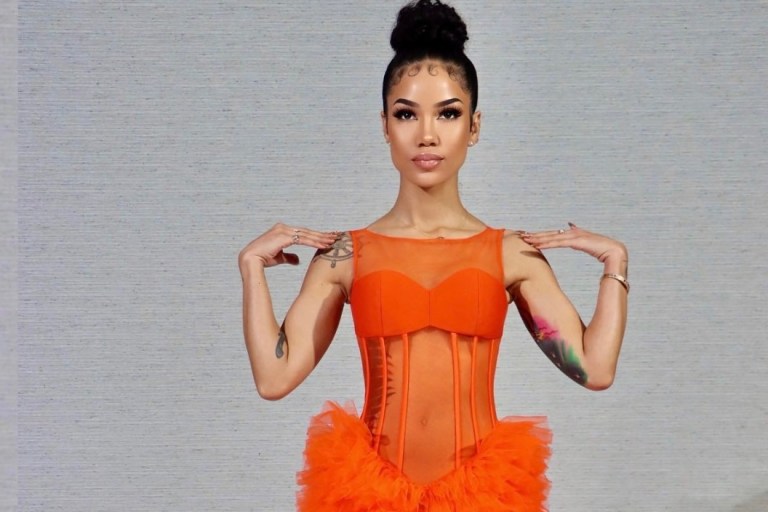 Jhené Aiko Brings In Her Birthday With Epic 2021 Grammys Performance Wearing Custom Jovana Louis Orange Tulle Gown