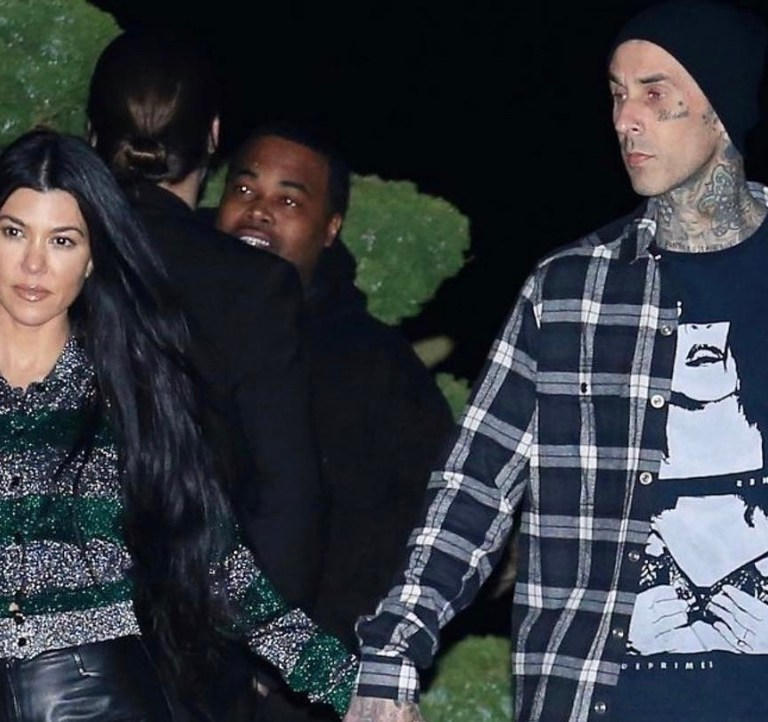 Kourtney Kardashian Spotted Out at Nobu Malibu With Travis Barker Wearing Victoria Beckham Lurex Button Top, Beau Souci Black Leather Cut-Out Pants and a Hermès Mini Green Kelly Bag