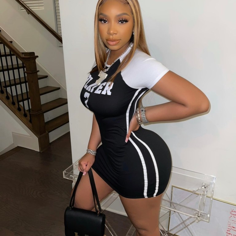LightSkinKeisha Posed in Black and White Sports-Inspired Mini Dress From Fashion Nova
