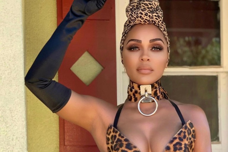 Meagan Good Covers Hello Beautiful’s March Issue in Zana Bayne Leopard Set, Rick Owens Black Cut Out Skirt and Femme LA Black Pumps