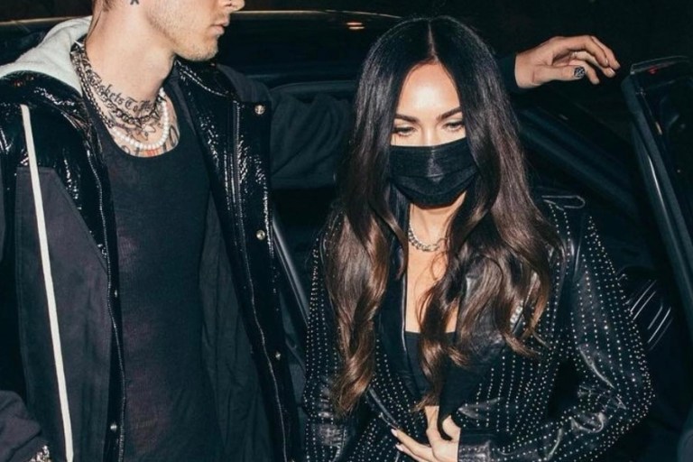 Megan Fox Spotted Dining With Beau Machine Gun Kelly at BOA Steakhouse Wearing Nour Hammour Black Leather Embellished Coat, Tom Ford Black Velvet Disco Platform Sandals, and Distressed Ksubi Jeans