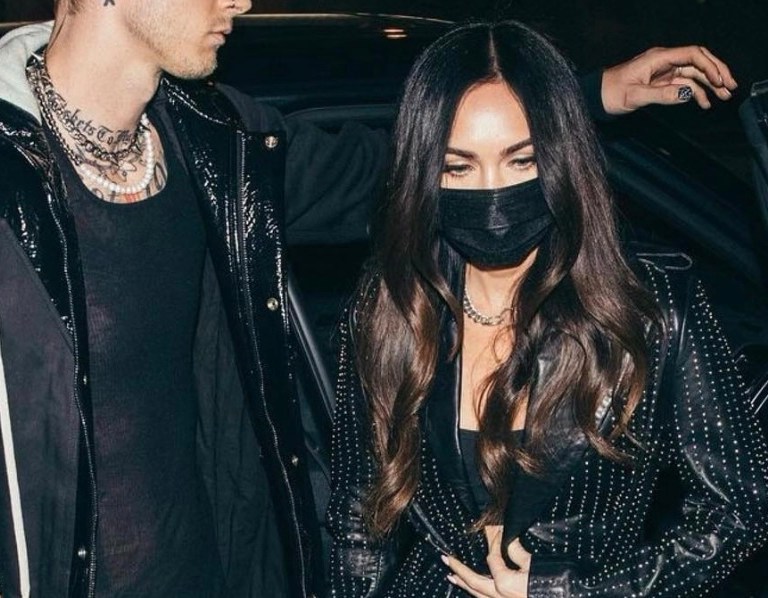 Megan Fox Spotted Dining With Beau Machine Gun Kelly at BOA Steakhouse Wearing Nour Hammour Black Leather Embellished Coat, Tom Ford Black Velvet Disco Platform Sandals, and Distressed Ksubi Jeans