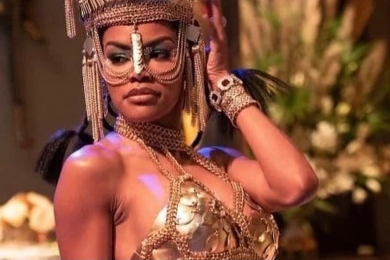 Teyana Taylor Wears Gold Plated Chain Look by Laurel DeWitt and Black and Gold One Piece by Cylinda Nesmith Davison in ‘Coming 2 America’ + Award-Winning Costume Designer Ruth E. Carter Chats With Bevy Smith