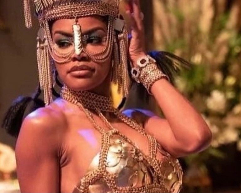 Teyana Taylor Wears Gold Plated Chain Look by Laurel DeWitt and Black and Gold One Piece by Cylinda Nesmith Davison in ‘Coming 2 America’ + Award-Winning Costume Designer Ruth E. Carter Chats With Bevy Smith