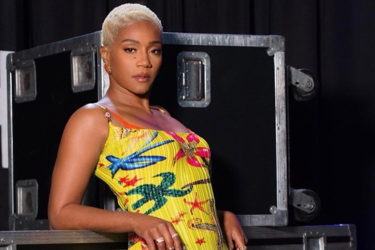 Tiffany Haddish Attends Nickelodeon’s 2021 Kids’ Choice Awards Wearing Versace Yellow Plisse Satin Starfish Print Spring/Summer 2021 Dress and Orange Stuart Weitzman Sandals