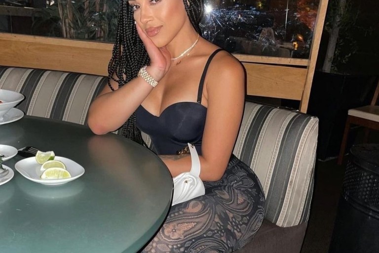 You Ask, We Answer: Joie Chavis’s Dinner Wolford Print Leggings and Christian Louboutin Double L Orange Sandals