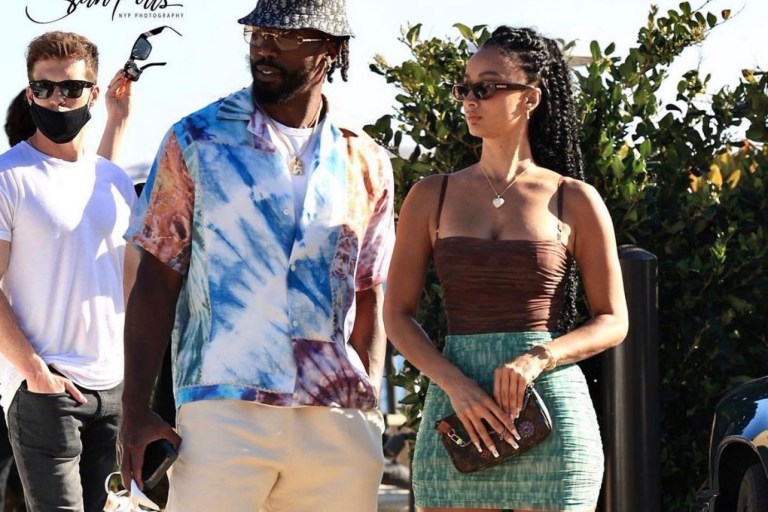 Draya Michele Spotted with Tyrod Taylor in Malibu Wearing House of CB Brown Sleeveless Mesh Bodysuit and Tie-Dye Ruched Mesh Mini Skirt