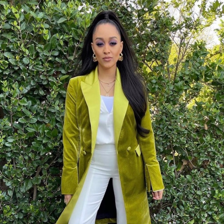 Tia Mowry Spotted Wearing Jonathan Simkhai White Look Paired With UNTTLD Green Velvet Belted Coat and Bottega Veneta Yellow Square-Toe Leather Sandals