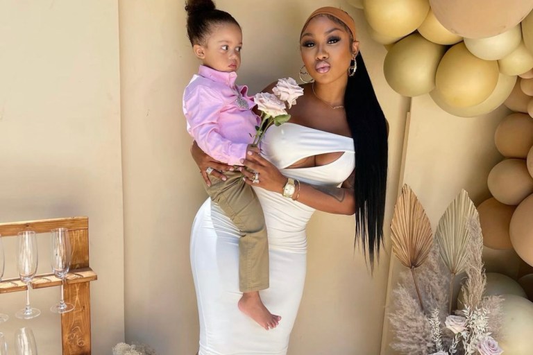 Ari Fletcher Celebrates Mother’s Day in Fashion Nova White Cutout One Shoulder Midi Dress