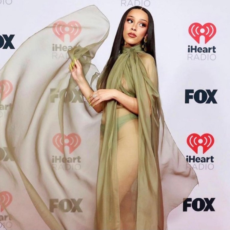 Doja Cat Graces the 2021 iHeartRadio Music Awards Red Carpet in Brandon Maxwell Green See-Through Dress