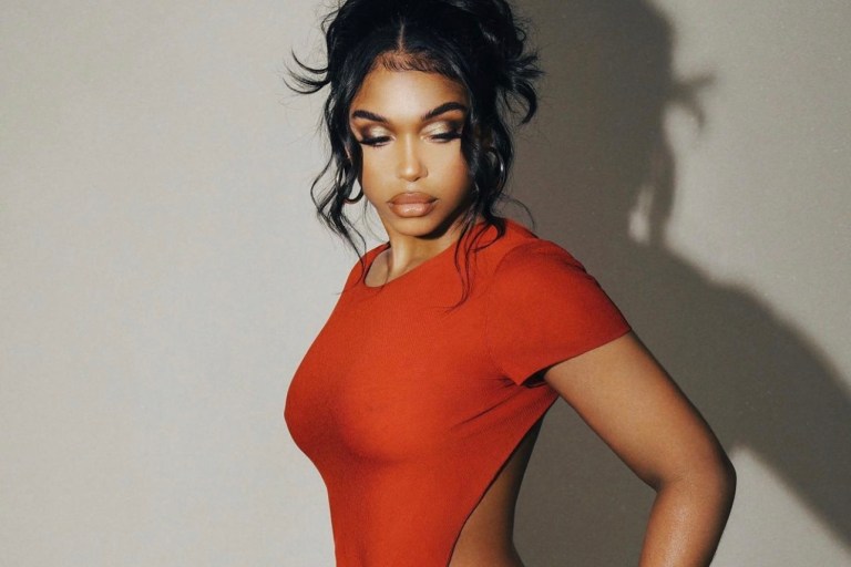 Lori Harvey Strikes a Pose in Red Vintage Gucci by Tom Ford Dress From Pechuga Vintage and Tom Ford Silver Disco Platform Heels