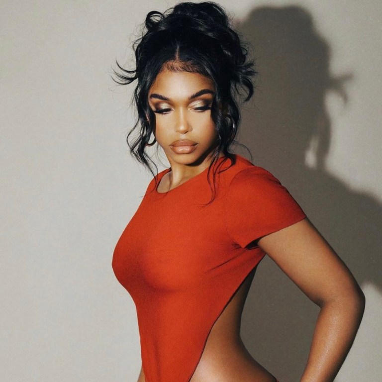 Lori Harvey Strikes a Pose in Red Vintage Gucci by Tom Ford Dress From Pechuga Vintage and Tom Ford Silver Disco Platform Heels