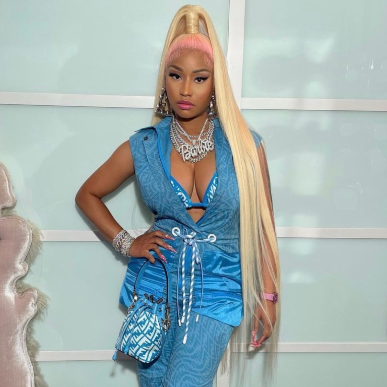 Nicki Minaj Goes Live in Fendi Blue Vertigo Monogram Bikini Top, Sleeveless Drawstring Jumpsuit, and Mon Tressor Bucket Bag With Christian Louboutin Blue Patent Leather Sandals