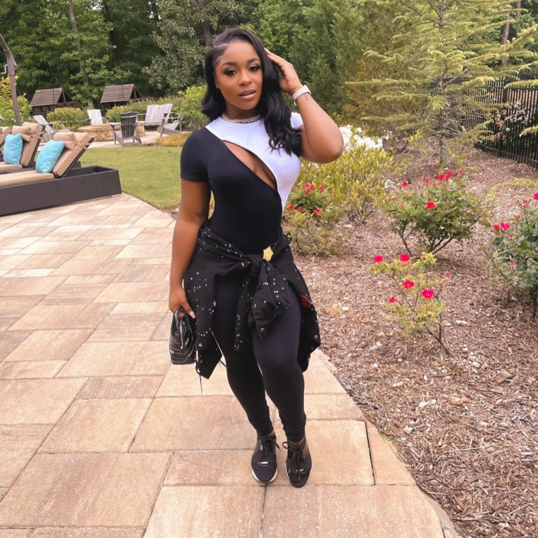 Reginae Carter Sports Black and White Short Sleeve Jumpsuit from Fashion Nova