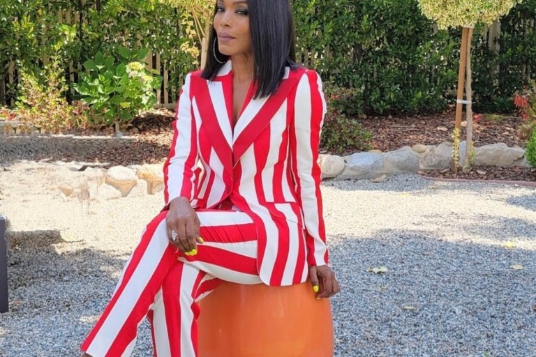 Angela Bassett Stuns in Summer-Ready Look Featuring Dolce and Gabbana Red and White Striped Pantsuit