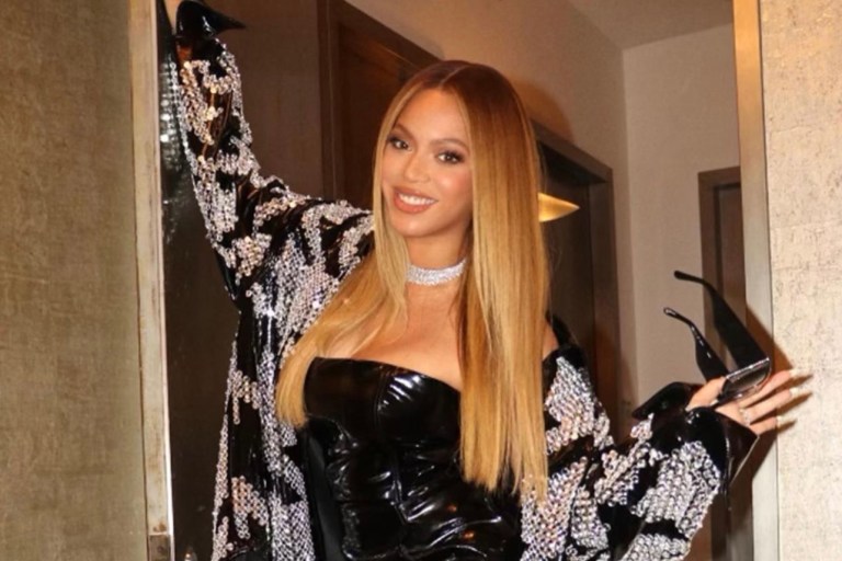 Beyoncé Wears David Koma Fall 2020 Look Including Black Strapless Patent Leather Mini Dress and Embellished Patent Leather Jacket to Brooklyn Nets Game