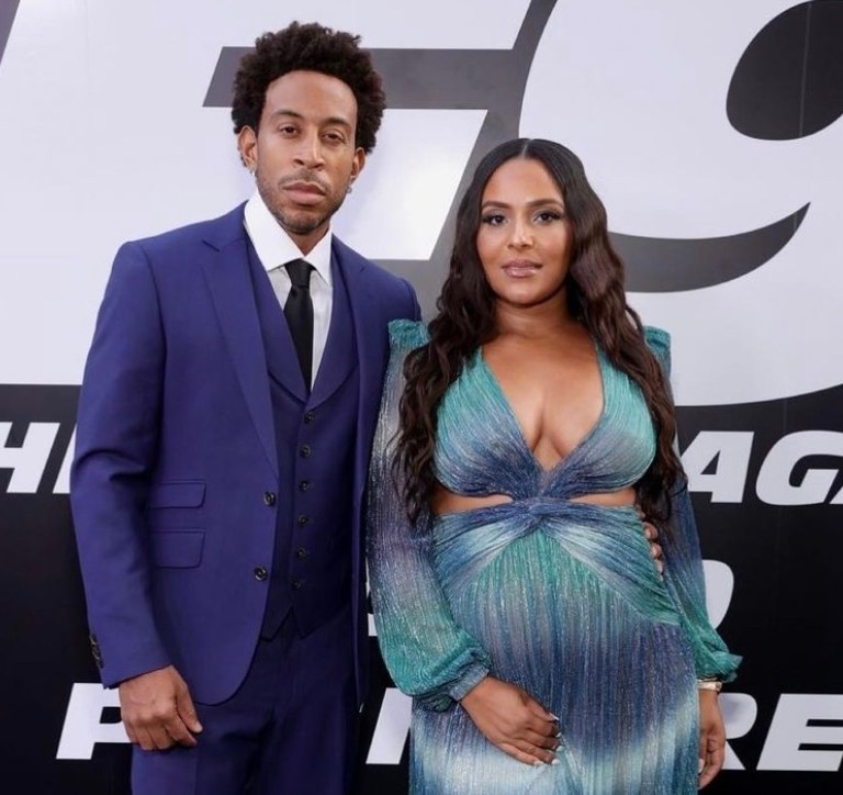 Eudoxie Attends the ‘Fast and Furious 9’ Premiere in LA With Ludacris Wearing PatBo Blue-Green Ombré Cutout Maxi Dress