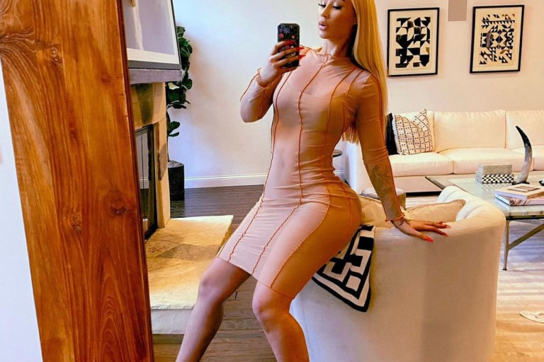 Iggy Azalea Poses for a Mirror Flick in a Nude Mesh Dress by Fashion Nova