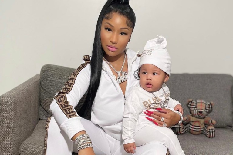 Nicki Minaj Holds Her Baby Boy Wearing Fendi Brown Logo Side-Stripe Track Jacket and Pants While ‘Papa Bear’ Looked Adorable in a Burberry Logo Onesie Set and Yeezy 380 Sneakers