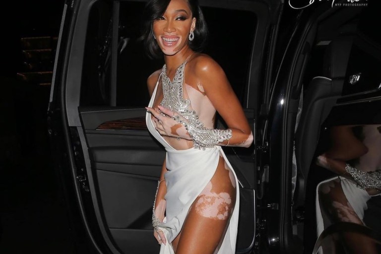 Winnie Harlow Steps Out in LA Wearing Custom Ravissaint White Embellished Gown