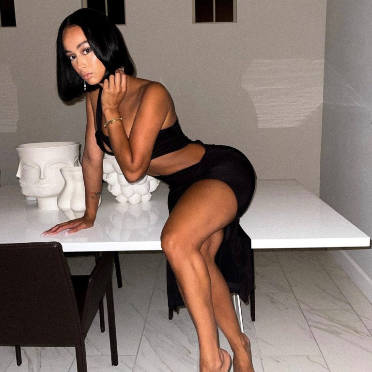 Draya Michele Delivers a Style Moment in Fashion Nova Black One Shoulder Cutout Dress