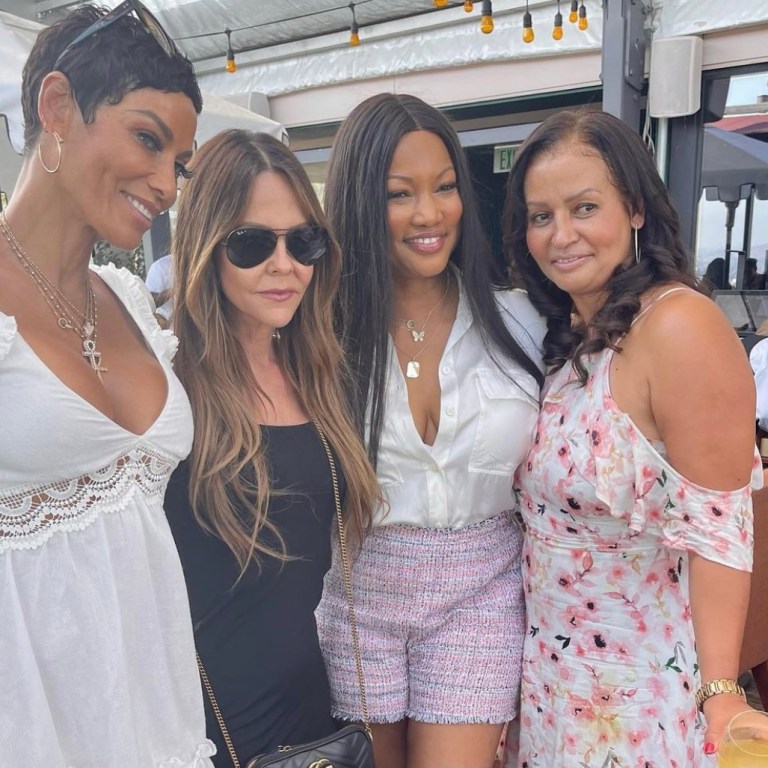 Garcelle Beauvais Spotted Out With Nicole Murphy, Allison Melnick, and Lisa Bubbles Wearing Cult of Coquette Silver Bow Sandals From BeautyLifeFun Shop