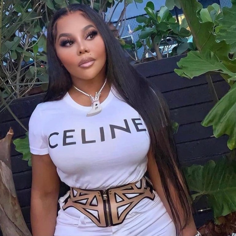 Lil Kim Attends Rolling Loud’s Opportunity Matters Panel in Miami Wearing White Look Featuring Celine Logo T-Shirt and Vertical Mini Tote