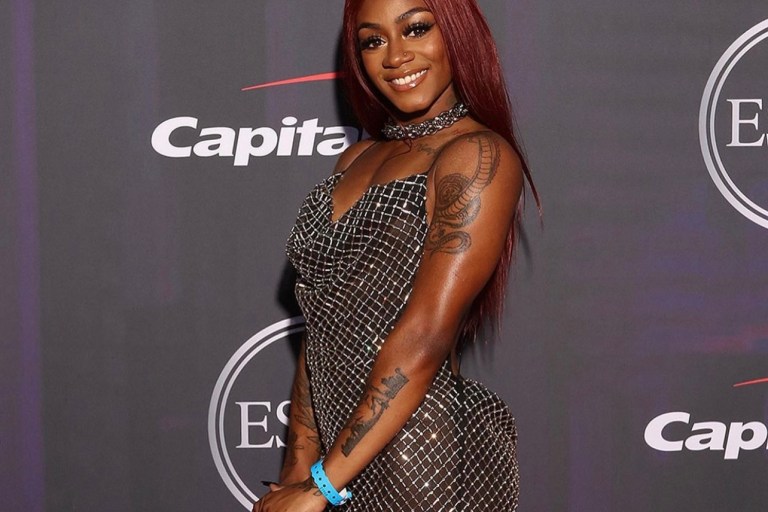 Sha’Carri Richardson Attends 2021 ESPYs Wearing LaQuan Smith Metallic Chain-Look Dress