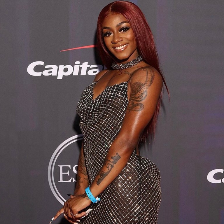 Sha’Carri Richardson Attends 2021 ESPYs Wearing LaQuan Smith Metallic Chain-Look Dress