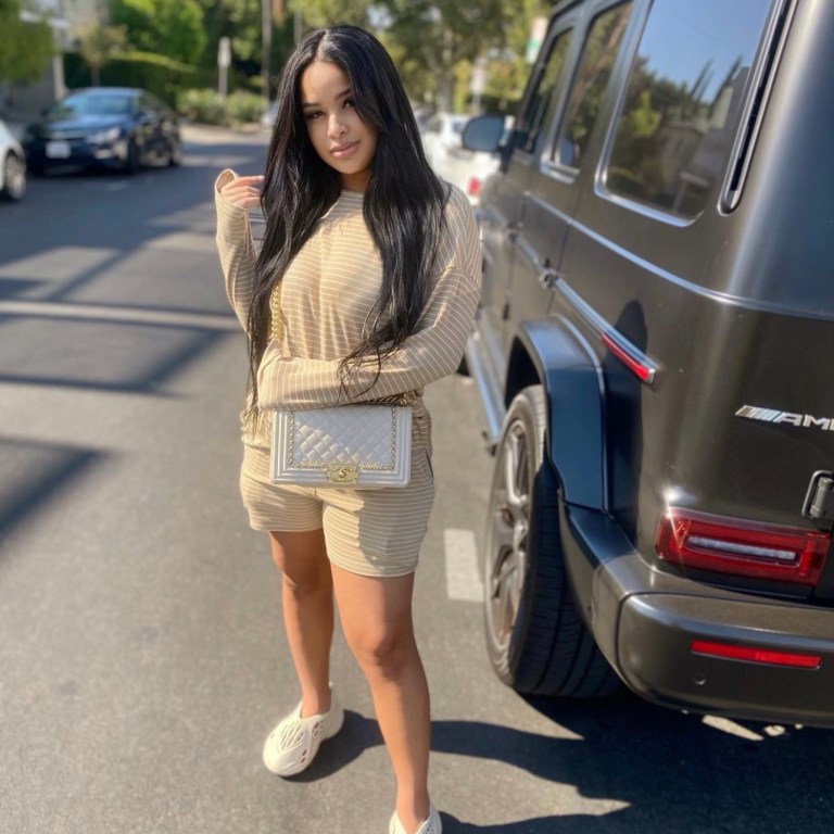 Taina Williams Spotted in Casual Look Featuring Fashion Nova Stripe Top and Short Set