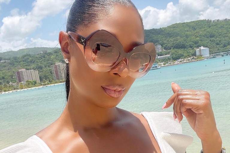 Wardrobe Inquiry: Jennifer Williams Soaks Up the Sun in Moon in Dolce and Gabbana Gradient Pink Sunglasses