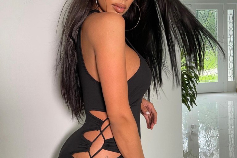 Erica Mena Brings the Heat in Sexy Fashion Nova Side Cutout Dress