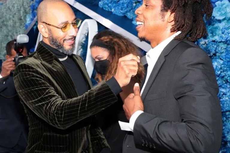 On the Scene at Jay-Z’s 40/40 Club Anniversary Party in NYC: Beyoncé in Versace Pink and Black Look, Megan Thee Stallion in Khaite White Off-The-Shoulder Dress, JT in Rick Owens White Jumpsuit+ More